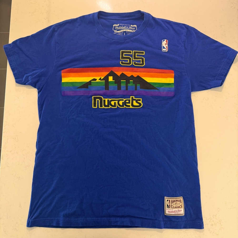 Blue Mutumbo 55 NBA Nuggets, more like a Medium. Washed once, never worn.